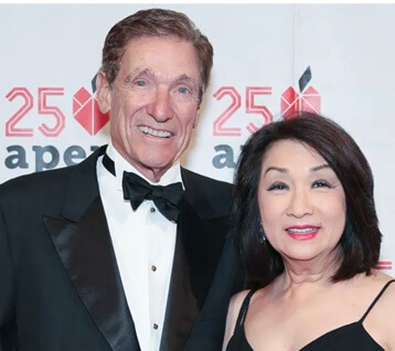 Maury Povich with his wife.
